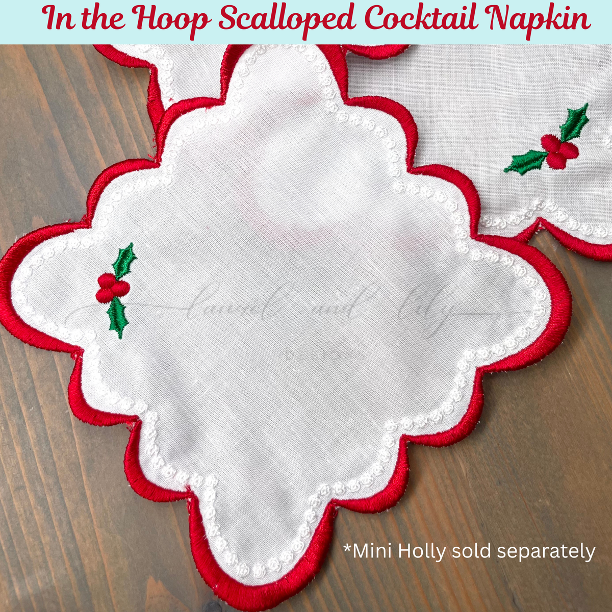 In the Hoop scalloped cocktail napkin with red trim and holly design on a wooden surface.
