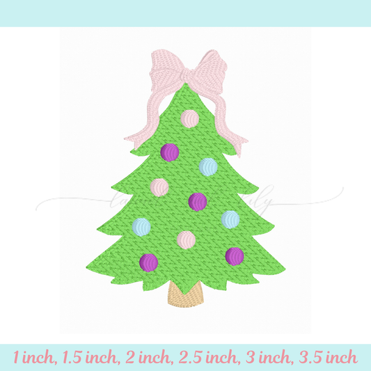 Green Christmas tree with colorful polka dots and a pink bow on a light blue background.